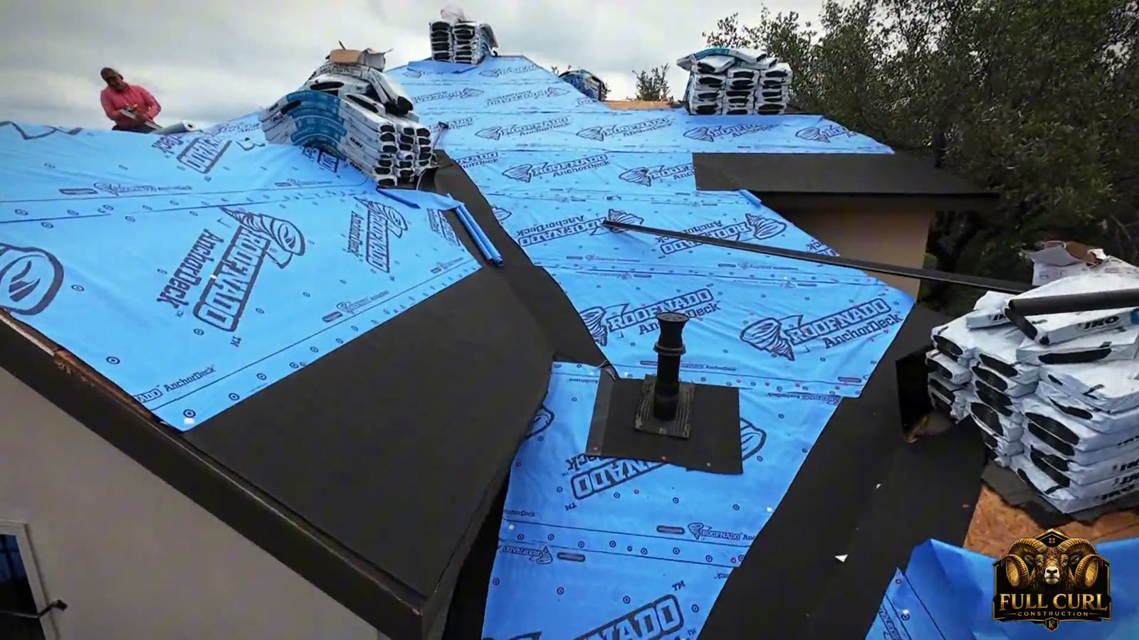 Roof replacement crew documented from above